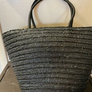 Black Capelli straw handbag. This bag has a sequin effect